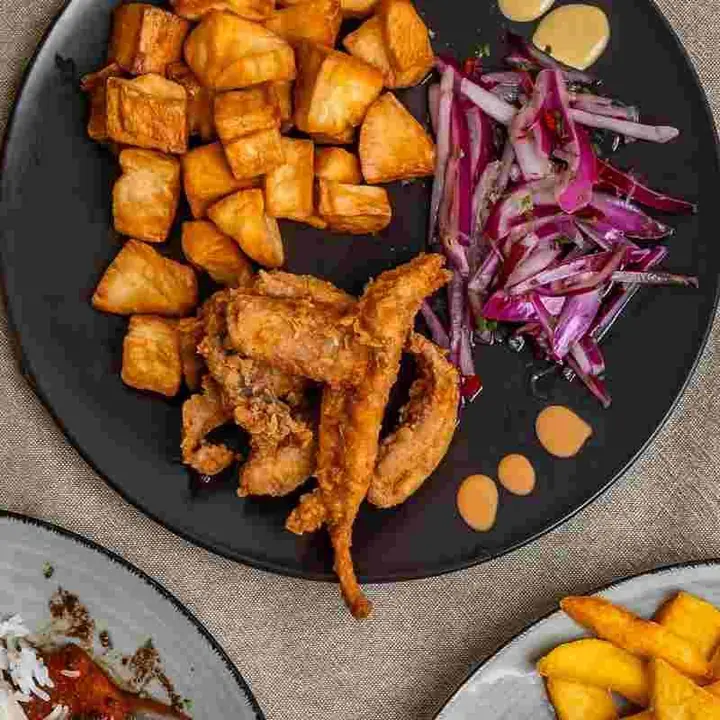 Fish jalea: crispy fried fish with cassava and salsa criolla